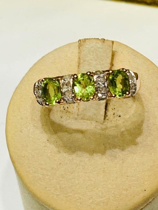 Redus  Inel aur 14 kcu peridot și diamante