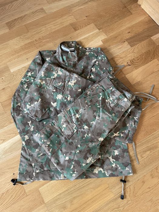 Costum combat nou