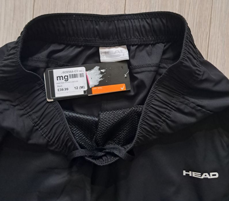 Дамски спортен панталон Head Club, размери M и XL.