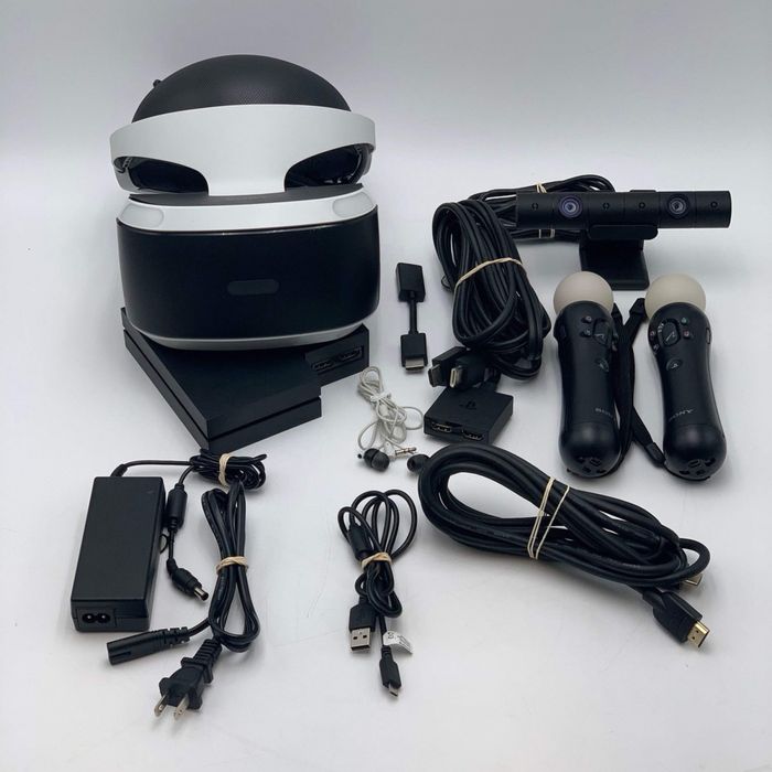 PS4 1TB + PS VR пълен комплект + 2 Move  палки + 4 джойстик + 30 игри