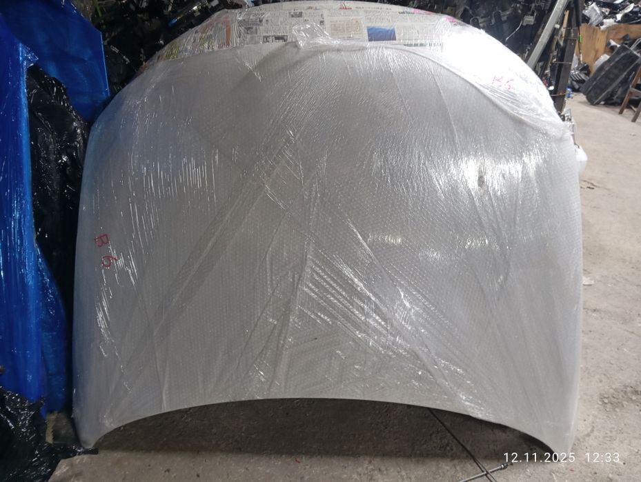 Капот Volkswagen Passat B6