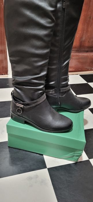 Продам новые сапоги