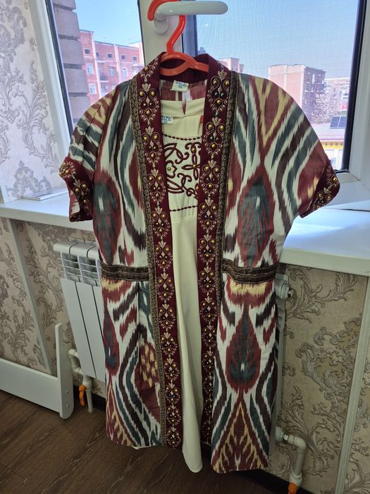 Национальное платье Миллий услуб, адрас