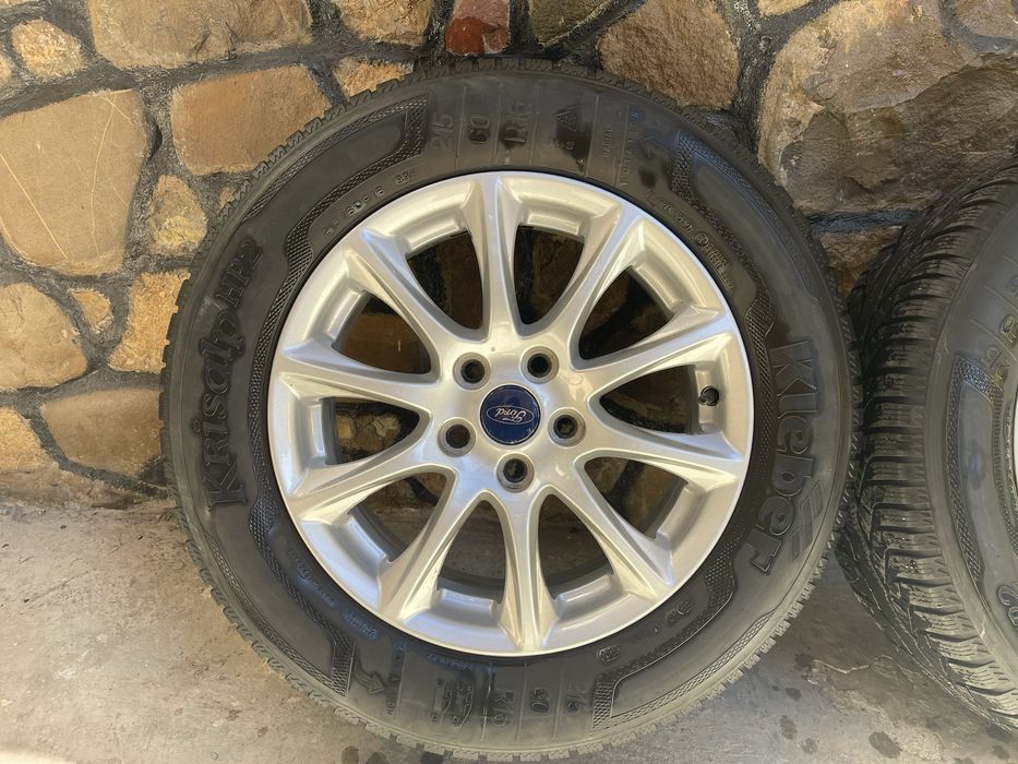 Jante cu cauciucuri de iarna ford 5x108 ET 50