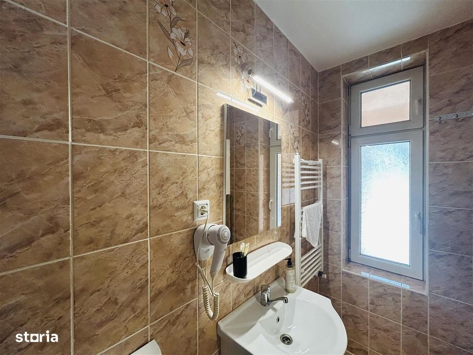 Apartament la casă – 105 mp utili, curte și pivniță – Zona Noica
