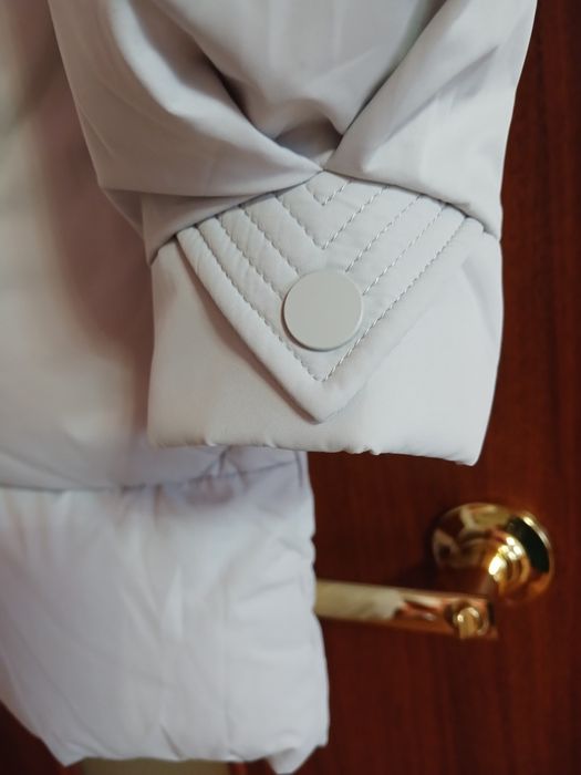 Продам пуховик новый