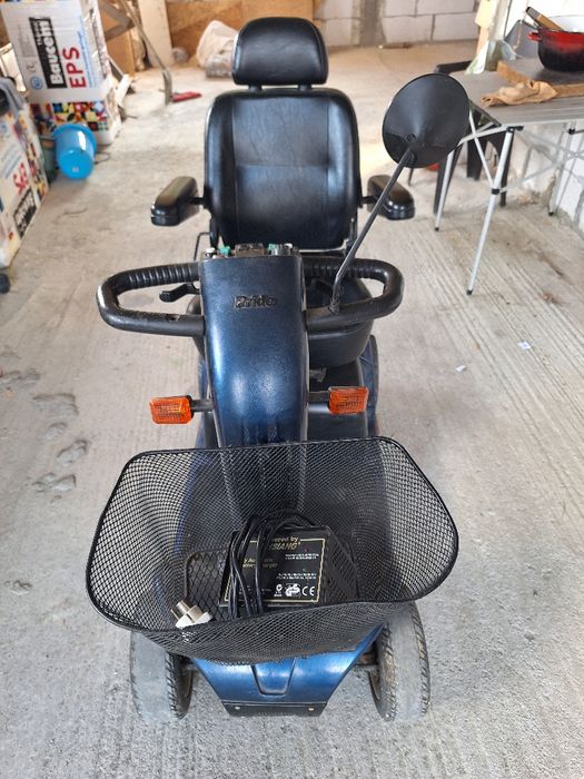 Carut electric pentru persoane cu probleme de mobilitate