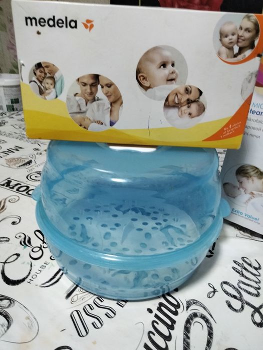 Молокоотсос и стерилизатор