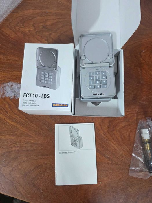 Buton cu cod radio Hörmann FCT 10-1 BS 4511861, 868 MHz, pentru până la 10 motoare de poartă