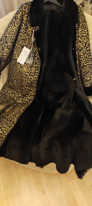 Норкавая дубленка женская