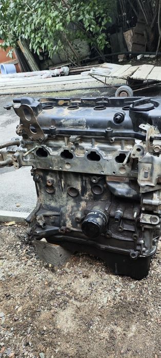 Двигатель QG15DE