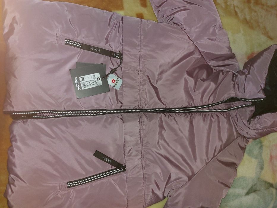 Продам пуховик новый