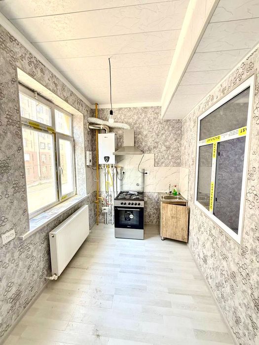 Яшнабад улица Иззат Новостройке продается квартира  2/2/8  42м2