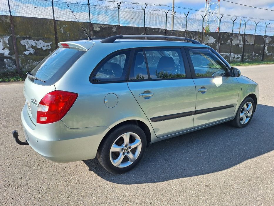 Skoda Fabia Greenline 2011  1200 cm TDi 90 cp  clima navi jante  Propietar