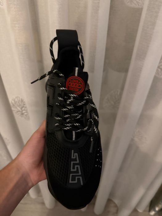 Versace chain reaction