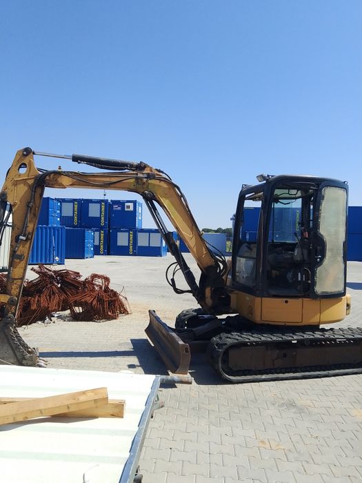 Багер  CAT 304CR