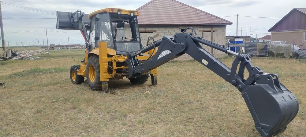 Экскаватор погрузчик XCMG XT873