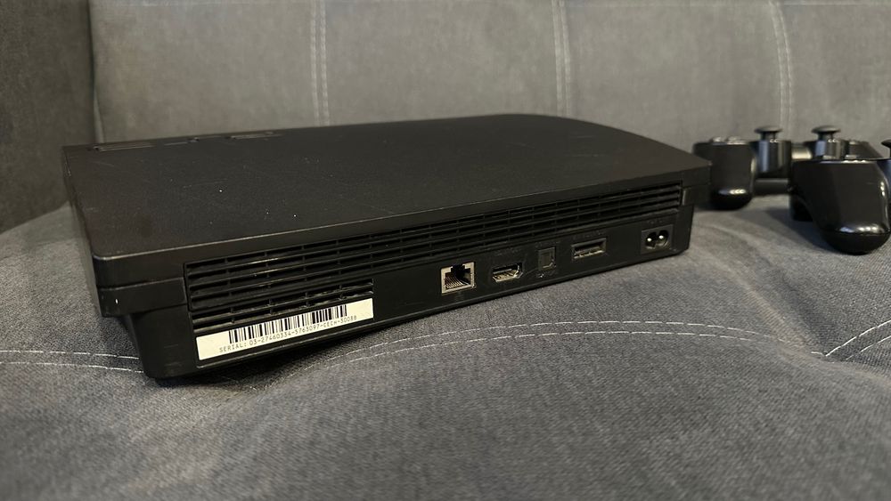 PlayStation 3 Slim 1TB +60игр+2джойстика