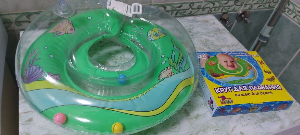 Коврик с игрушками