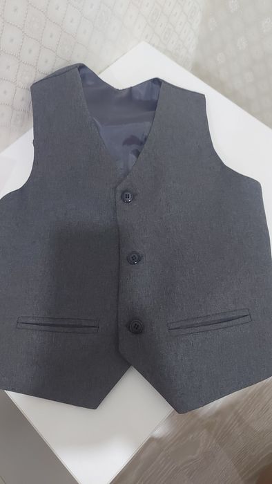 Продам серую жилетку