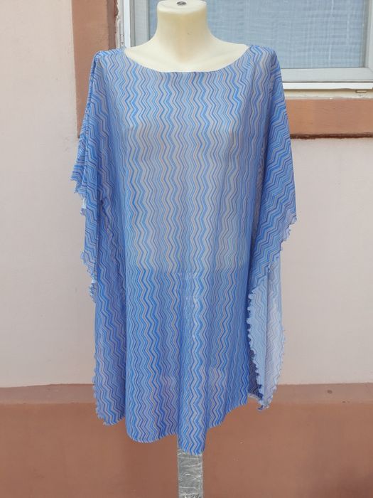 Tunica super draguta pentru plajă  .