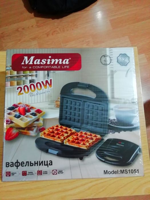 Вафельница новая в упаковке.