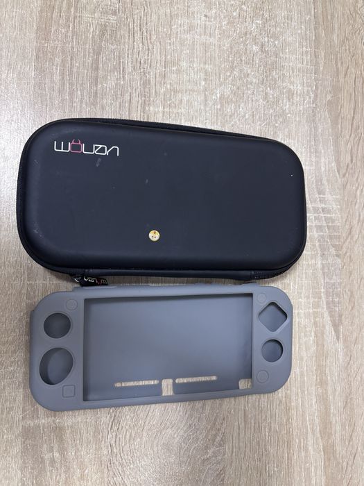 Vand consola Nintendo Switch + 5 jocuri