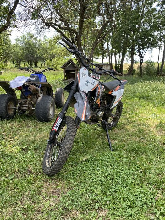 Schimb cross de 125 cc cu ATV