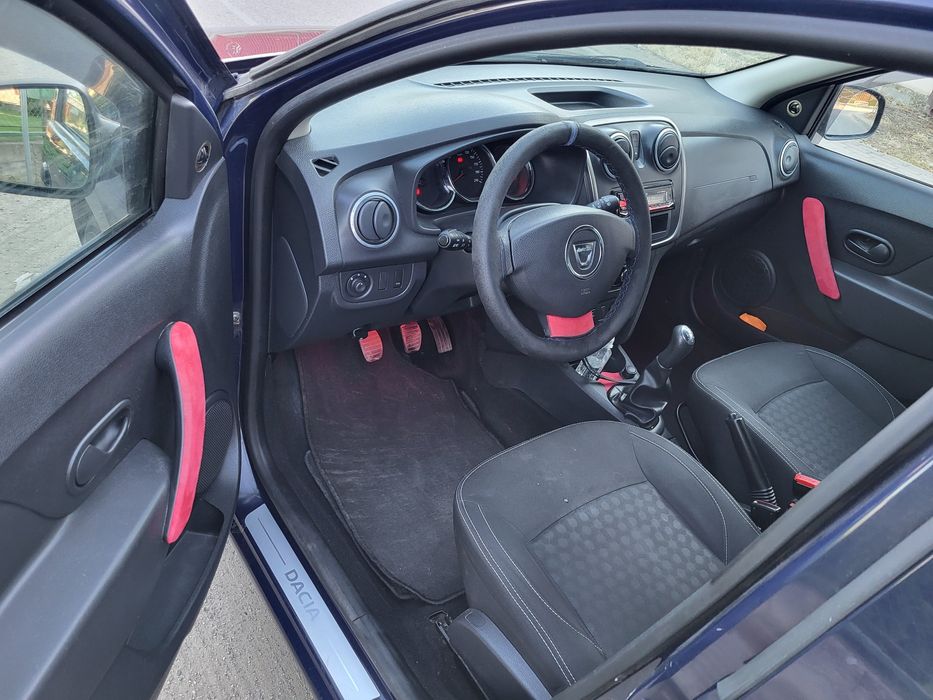 Dacia logan sandero diesel . Clima. Geamuri electrice. AC. Mod Eco