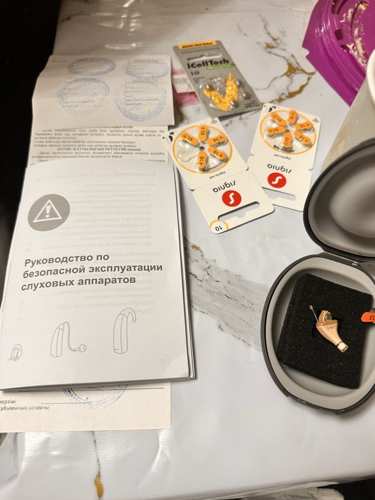 слуховой аппарат носить в ухе