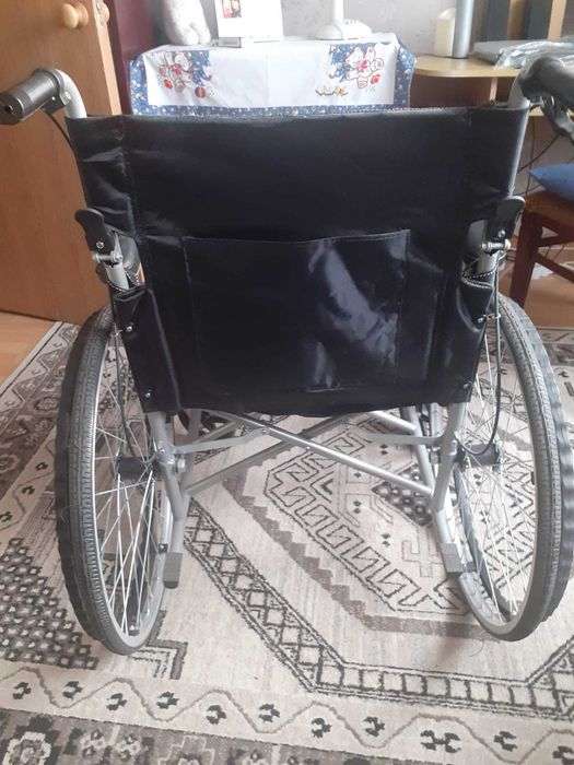 Carucior cu rotile pliabil