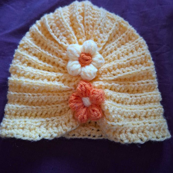 Бебешка ръчно плетена зимна ( шапчица (03-09м)
