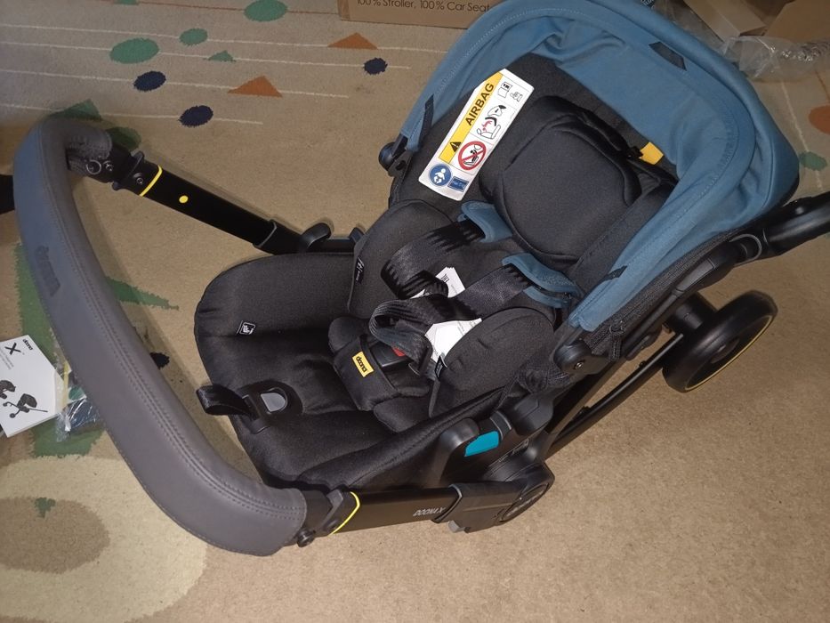 Новая коляска doona