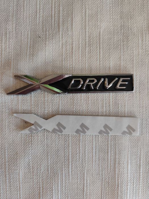 Емблема BMW X drive
