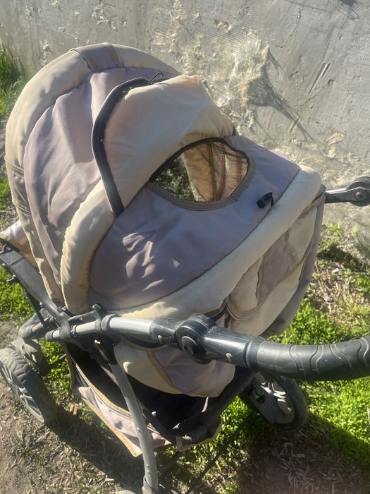 Детская коляска с сиденями