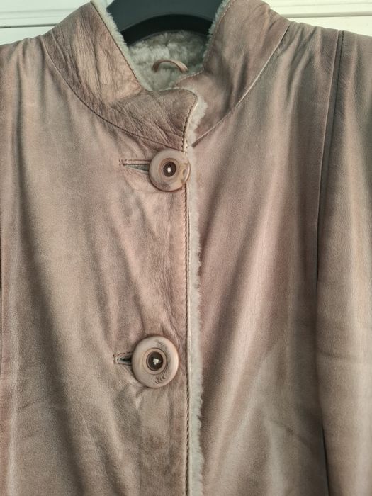 Haina scurta de piele captusita cu blana