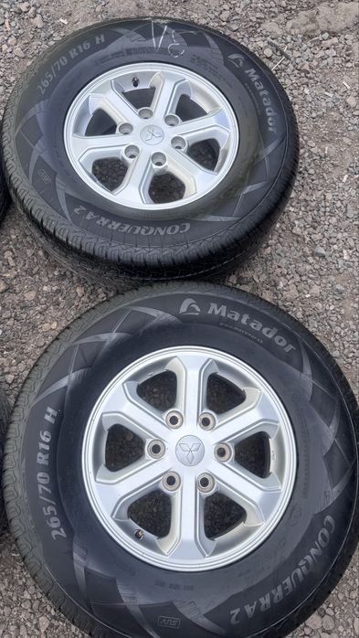 Диски  от Паджеро  Р16  с шинами
