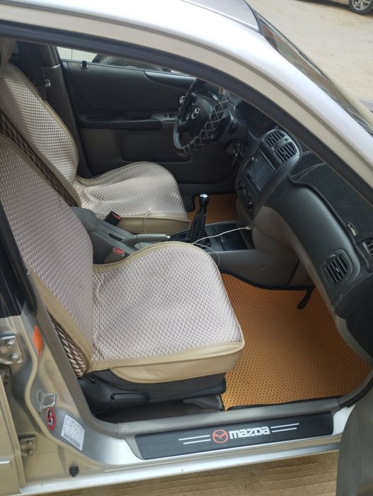 Мазда 323 bj ...