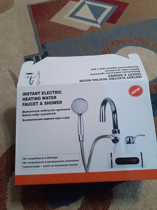 Продам водонагреватель кран  новый