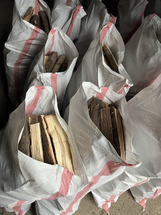 Дрова в мешках фасовка