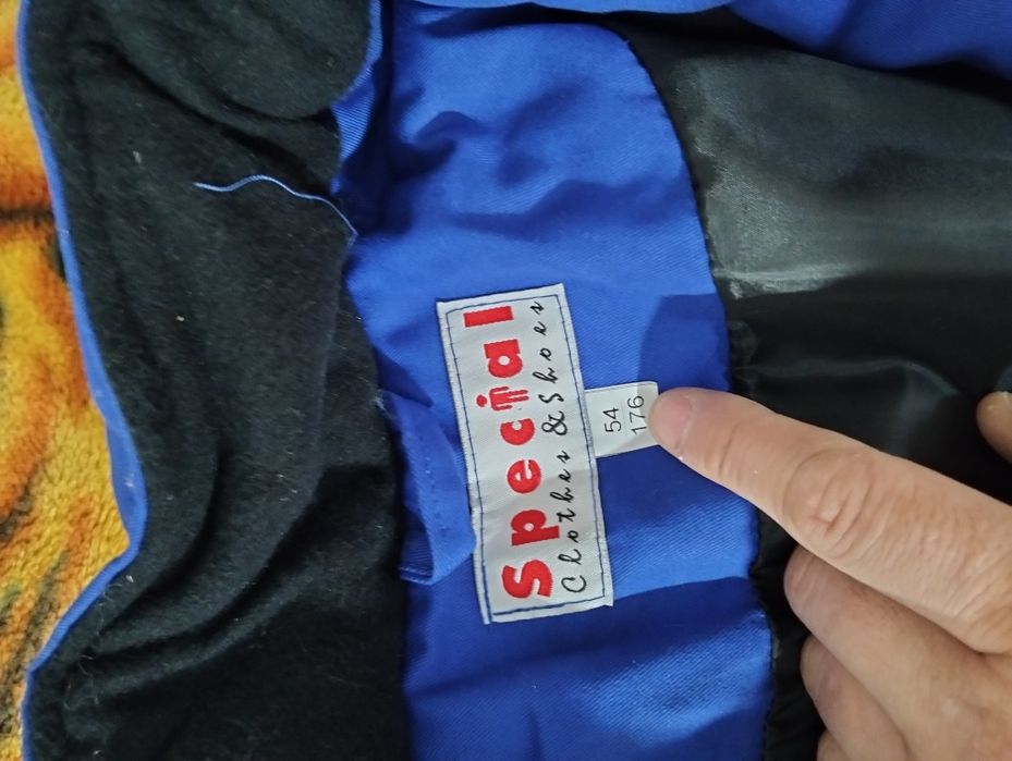 Продам новый зимний комбинезон