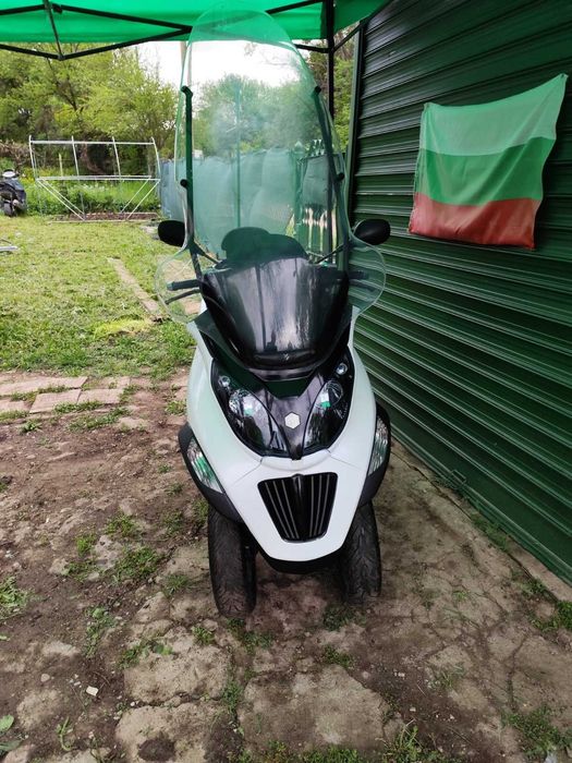 Пиаджо МП3 Piaggio MP3 300 кубика