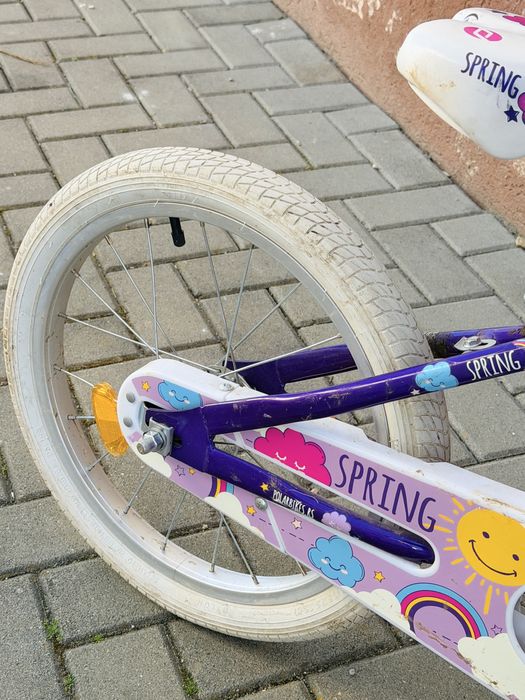 Bicicletă de copii Polar Junior Spring cu roți de 18 inch, într-o nuanță de mov.