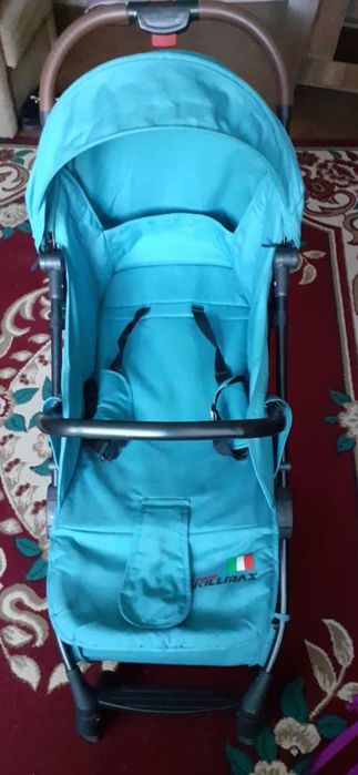 Детская прогулочная коляска всесезонная