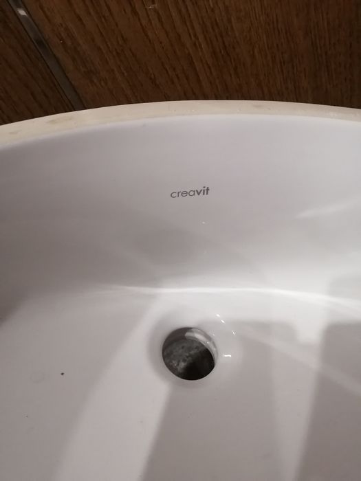 Раковина керамическая