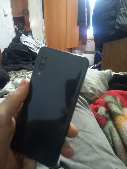 Телефон в средним состаяни