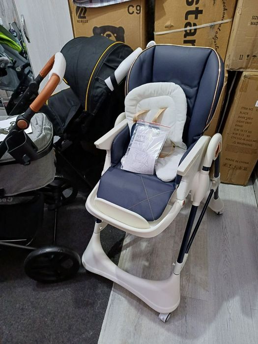 Продаётся фирменный кормление стульчик новый