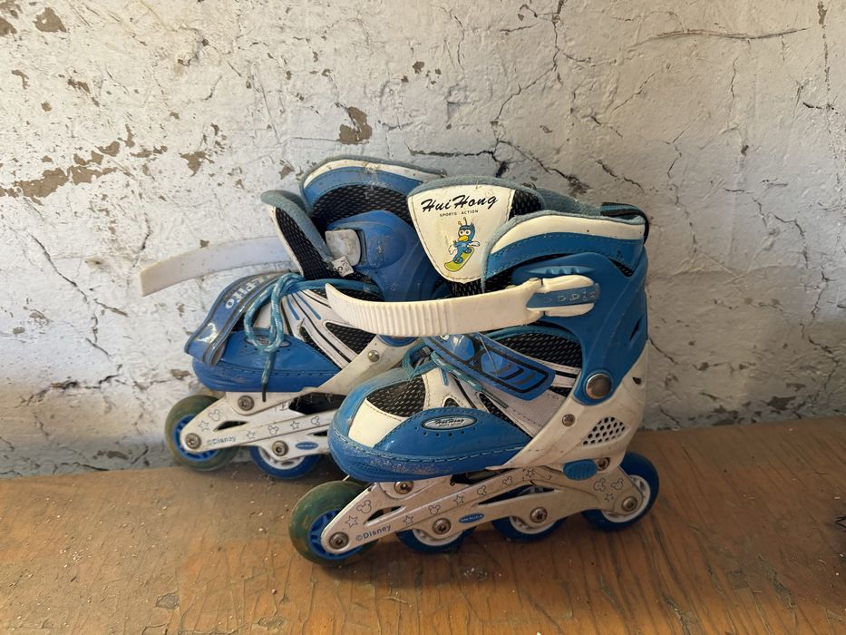 Роликовые коньки