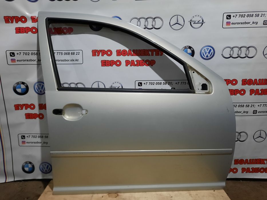 Двери на VW Bora