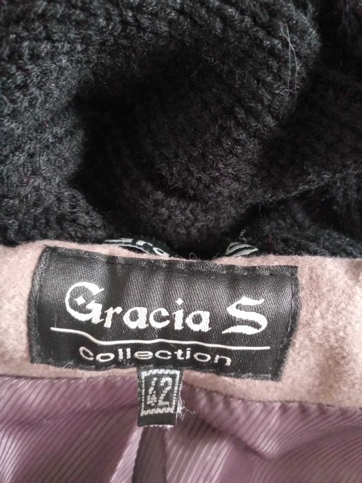 Верхняя женская одежда.